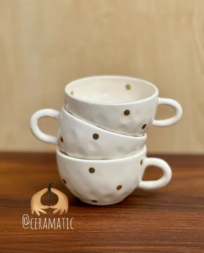 فنجان دفرمه خال خالی طلایی